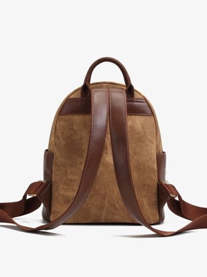 Mini cartoon cat backpack bag in caramel brown with adjustable straps and leather accents.
