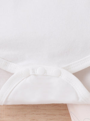 White baby bodysuit with snap closure detail and subtle bunny graphic on lower portion.