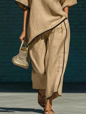 Khaki two-piece set with half sleeves and contrast trim details.