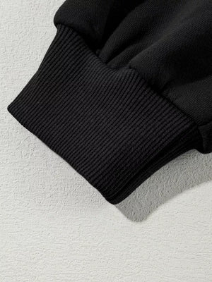 Black cotton joggers with ribbed cuff detail