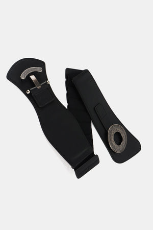 Black elastic wide belt with sculpted alloy buckle and decorative ring detail.