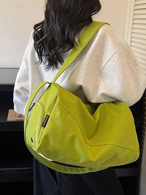 Green Oxford cloth travel organizer bag with adjustable strap and front pocket