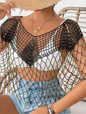 Black crochet cardigan with gold beads and fringe detail, V-neck, short sleeves.