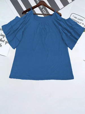 Blue t-shirt with gathered neckline and ruffled cold shoulder sleeves.