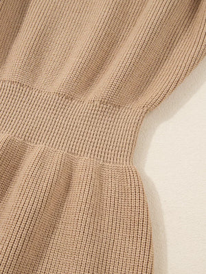 Ribbed knit sweater dress in tan with a defined waist and keyhole detail.