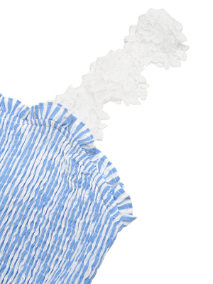 Blue and white striped smocked midi dress with ruffled neckline and white lace trim strap.