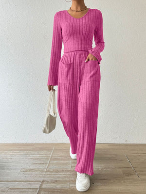 Hot Pink ribbed knit loungewear set with V-neck top and flared pants with pockets.