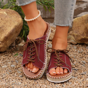 Red canvas lace-up open-toe flats with espadrille sole detail