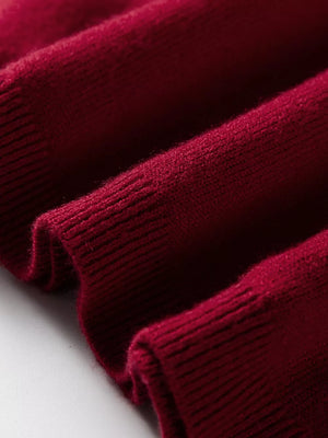 Burgundy crew neck cap sleeve sweater with ribbed texture detail