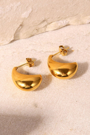 Sculpted gold crescent hoop earrings with post backs