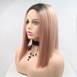 Ombre bob wig in black and pink, styled straight with a center part.
