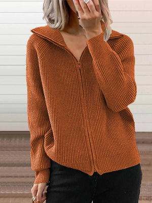 Orange ribbed knit zip-up trench coat with collar and pockets