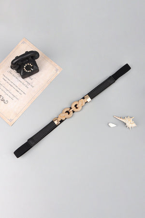 Black elasticated waist belt with gold linked knot detail