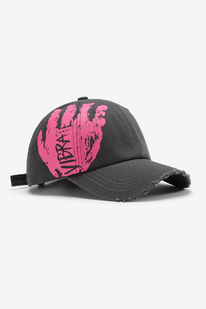 Dark gray baseball cap with distressed brim and pink VIBRA graffiti graphic.