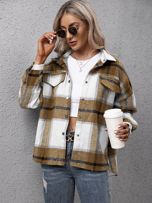 Overshirt in camel plaid with button-up front and chest pockets.