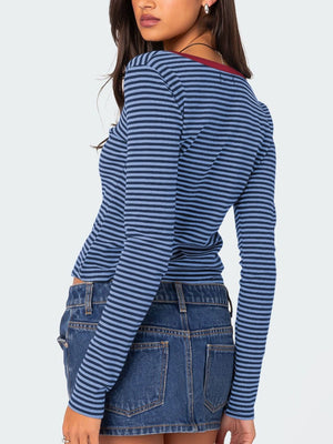 Striped long sleeve Henley shirt in blue with a contrast deep red collar.