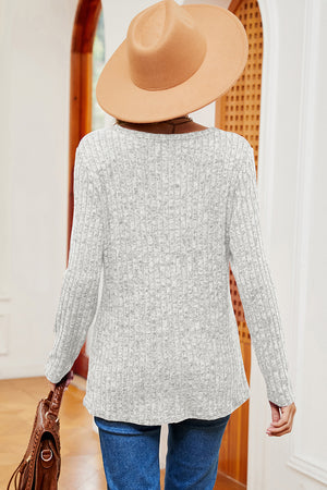 Light Gray ribbed knit top with eyelet shoulder detail, long sleeves, and scoop neck.