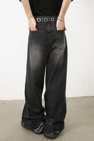 Dark balloon-leg denim jeans with subtle fade and distressed hem