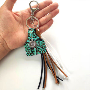 Turquoise leopard print tag keychain with flower charm and leather tassels