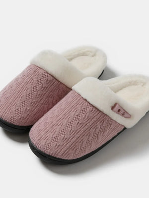 Dusty Pink cable knit shearling house slippers with faux fur lining and button detail.