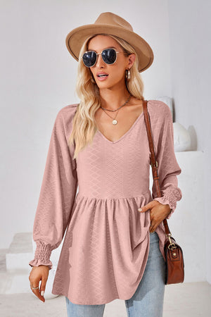 Dusty Pink textured babydoll blouse with v-neck and smocked cuffs