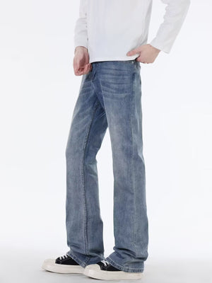 Men's classic blue cotton jeans with a comfortable fit.