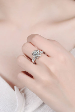 Silver ring with floral halo moissanite and pave band