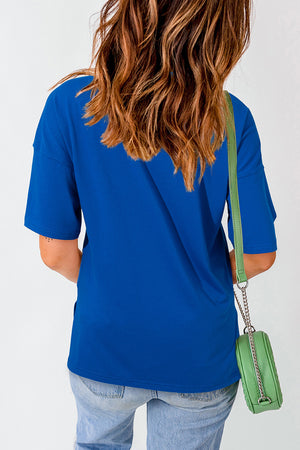Royal blue distressed flag tee with short sleeves and a relaxed fit.