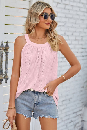 Blush pink eyelet halter tank top with gathered neckline and casual fit.