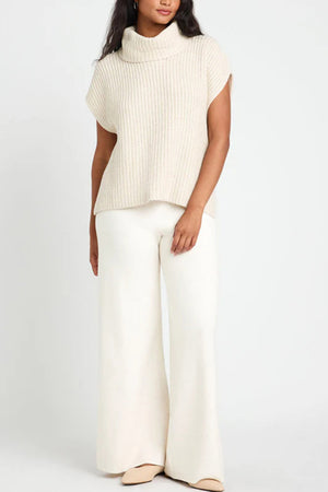 Sleeveless ribbed turtleneck sweater in ivory, casual knit style