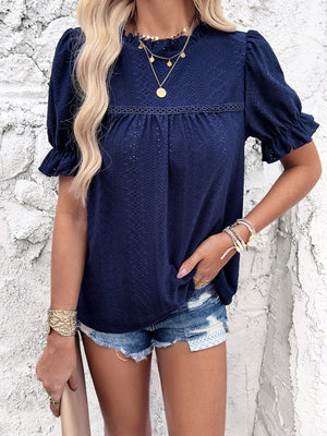 Dark Blue eyelet blouse with ruffled puff sleeves and neckline.