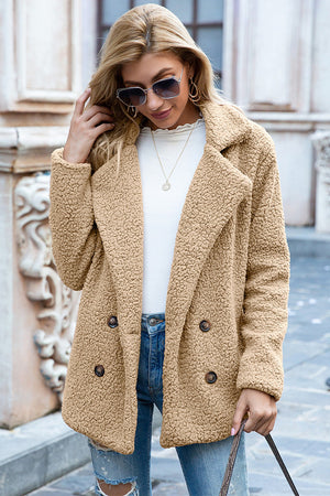 Camel teddy pea coat with double-breasted closure and notched lapels.