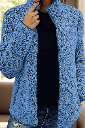 Teddy fleece zip-up jacket in Royal Blue with a stand-up collar and zippered closure.