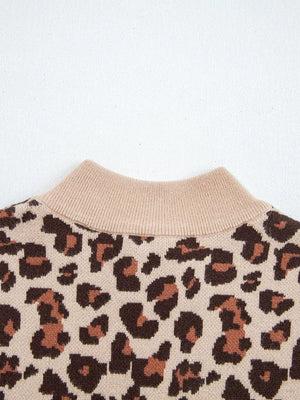 Leopard print ribbed high neck sweater dress with beige mock neck detail.