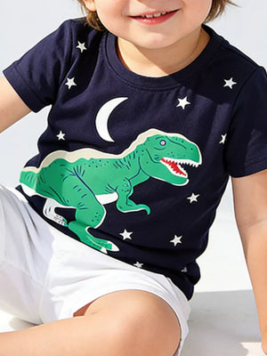 Navy cotton t-shirt with a green dinosaur, moon, and stars graphic for kids.