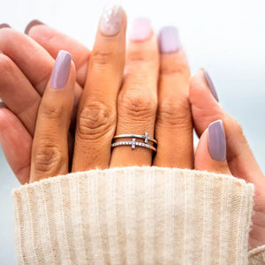 Double Cross Diamond Band Ring in silver with two stacked bands and diamond accents.
