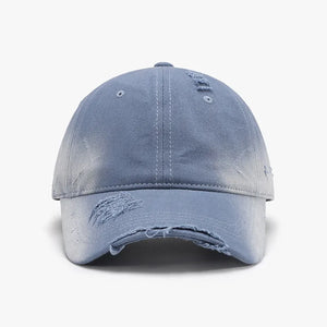Light blue distressed denim baseball cap with frayed details