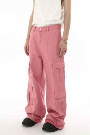 Oversized dusty pink cargo palazzo pants with multiple pockets and a button front.