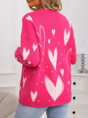 Heartfelt Fuchsia Knit Sweater with allover white hearts, crew neck, acrylic.