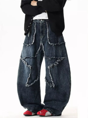 Star Patchwork Distressed Wide Leg Jeans in dark wash denim with frayed details.