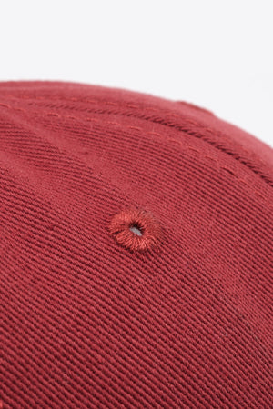 Deep Red baseball cap with embroidered detail and ventilation eyelet.