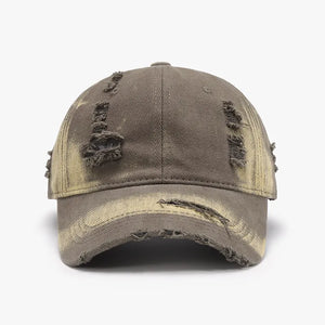 Shredded canvas baseball cap in mocha with distressed details and a faded effect.
