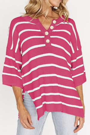 Hot pink and white stripe knit pullover with button-down henley neckline and 3/4 sleeves.