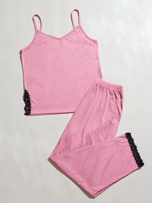 Pink cami lounge set with black lace trim on hem and pants.