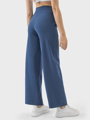 Dusty blue wide-leg drawstring active trousers with pockets.