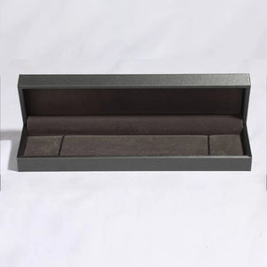 Dark gray jewelry box with velvet lining for a bracelet