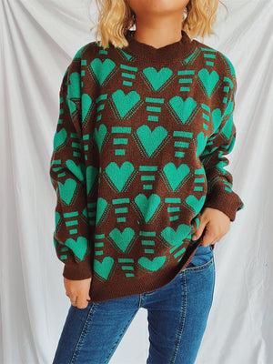 Brown acrylic knit jumper with allover green geometric heart pattern.