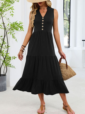 Black tiered midi dress with V-neck and decorative buttons.