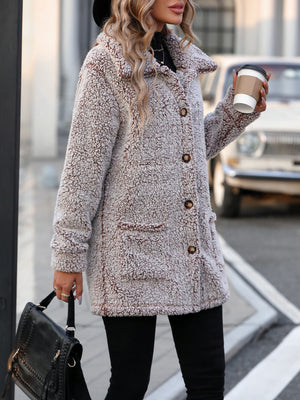 Taupe teddy bear textured button-down coat with patch pockets and brown buttons.