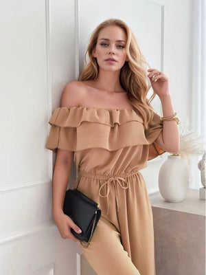 Camel off-the-shoulder jumpsuit with double ruffle detail and drawstring waist.